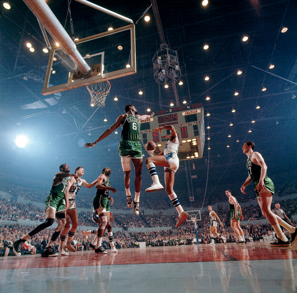 Bill Russell goes for a block