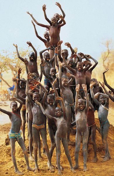 Dinka Children on Termite Mound