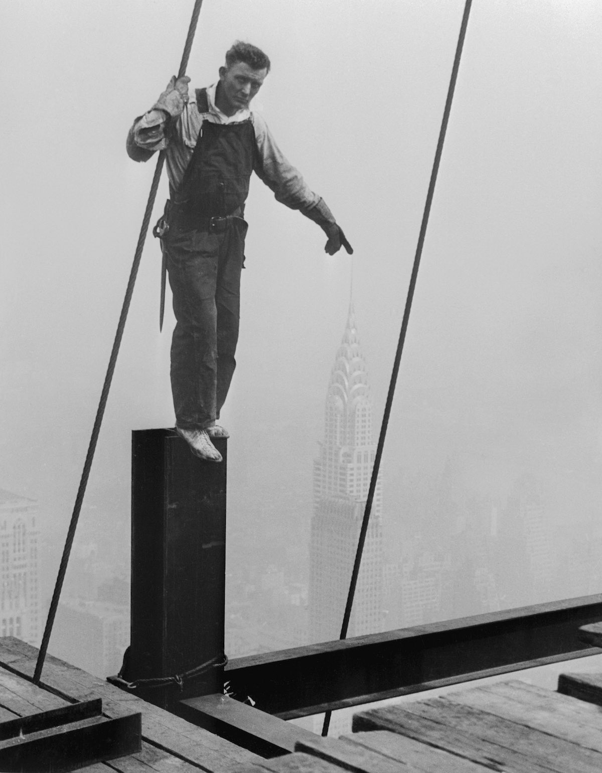 Man Performing Optical Illusion with Chrysler Building