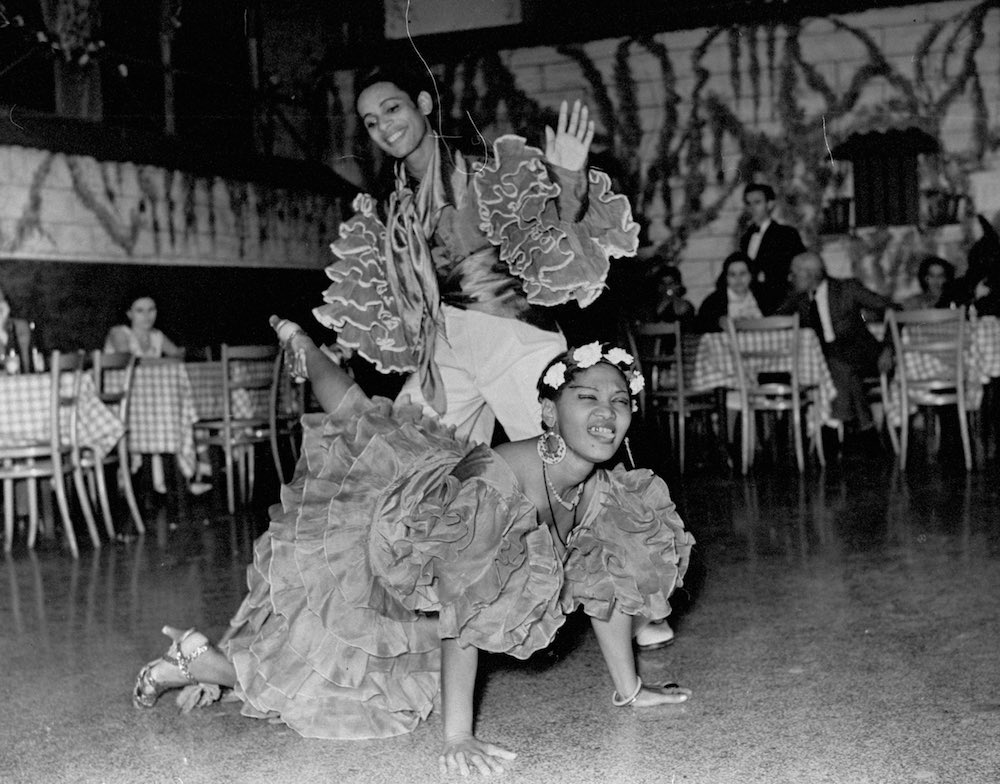 A view of people dancing at a Cuban club