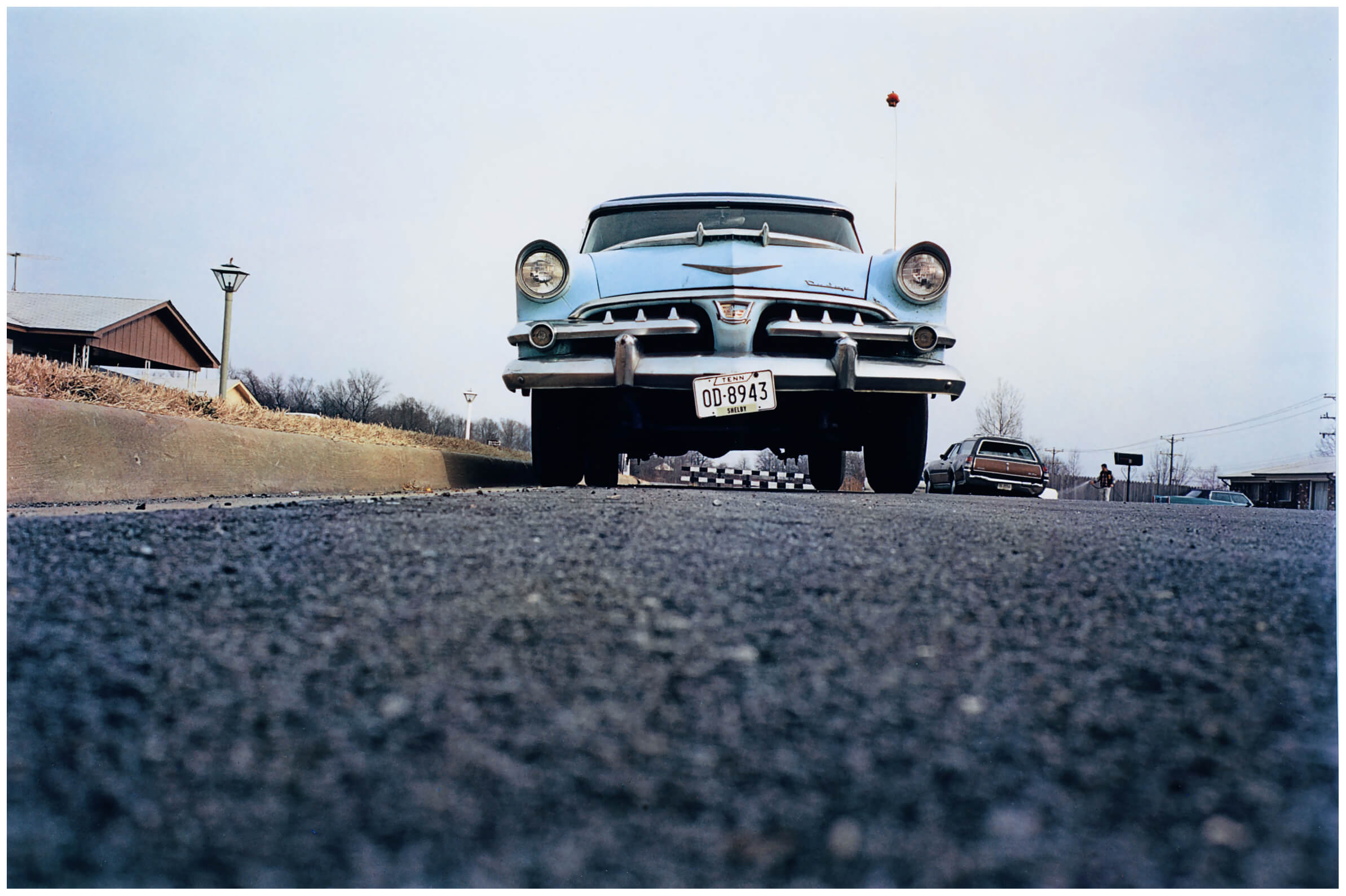 R44 Eggleston, Untitled, blue car on suburban street 002
