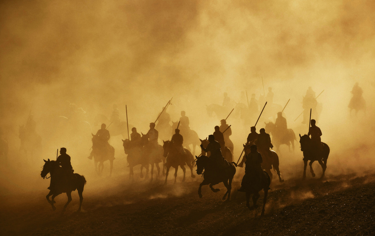 Horsemen holding spears ride during the first running of the bulls in the village of Cuellar, Spain, Sunday, Aug. 30, 2009. Cuellar's running on the bulls are considered as the oldest in Spain dating back to the late fifteenth century. (AP Photo /Daniel Ochoa de Olza)