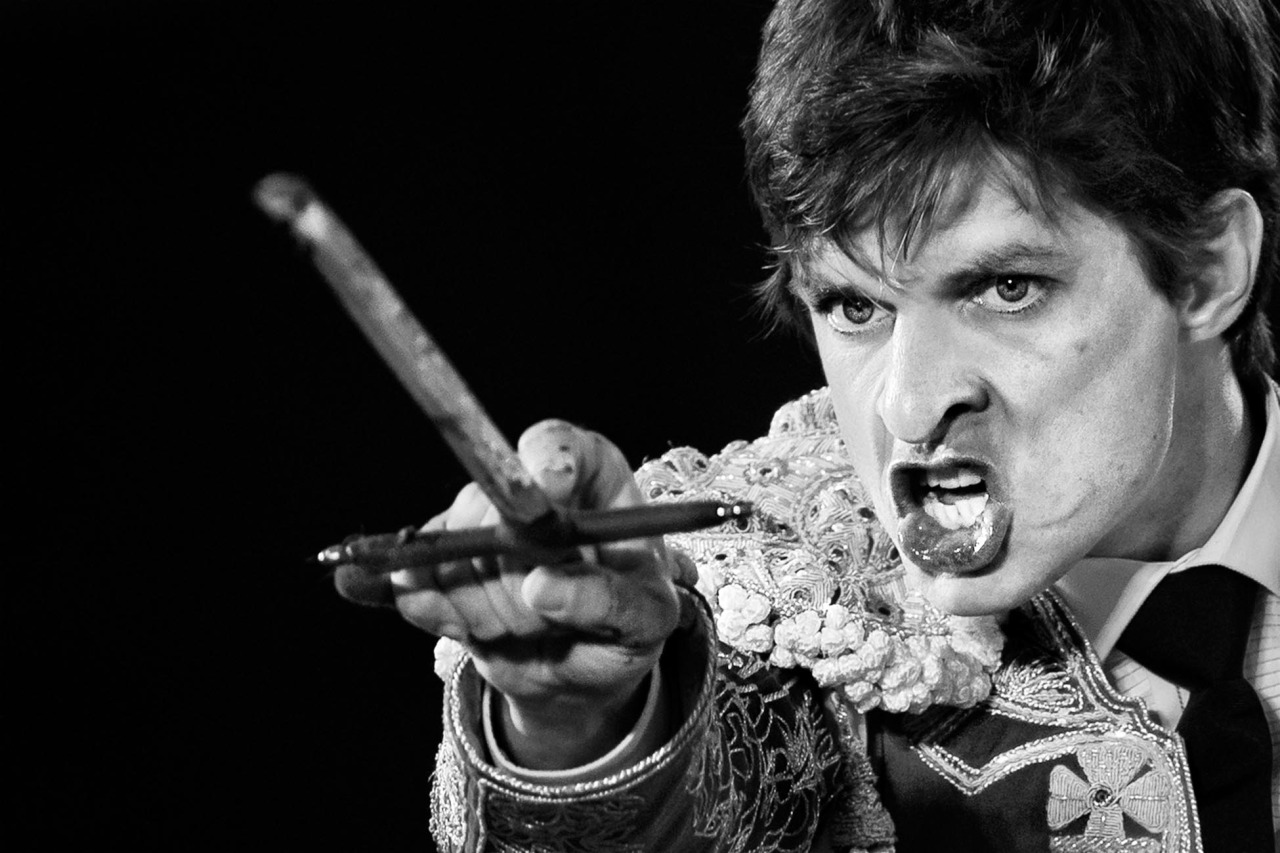 Spanish bullfighter Julian Lopez 'El Juli' aims his sword just before killing a bull with it during a bullfight in the southwestern Spanish town of Olivenza, Spain, on Sunday, March 3, 2013. Bullfighting is an ancient tradition in Spain and the season runs from March to October.(AP Photo/Daniel Ochoa de Olza)