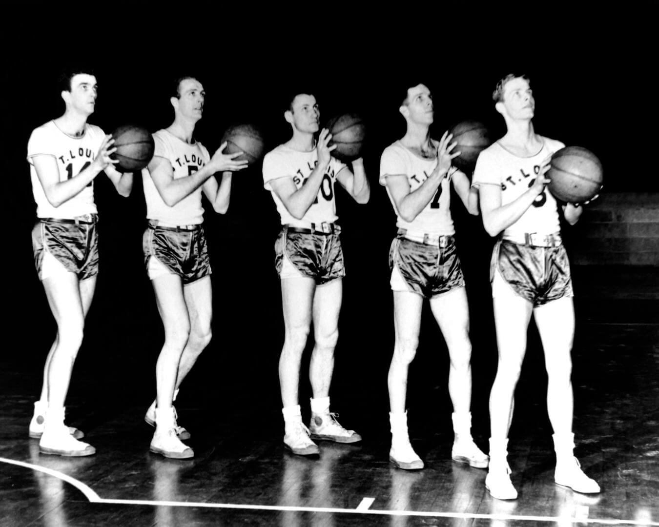 ST. LOUIS - 1947: (L-R) Don Martin, Bob Doll, Belus Smalley, John Logan and George Munroe of the St. Louis Bombers pose for a portrait circa 1947 in St. Louis, Missouri. NOTE TO USER: User expressly acknowledges and agrees that, by downloading and or using this photograph, User is consenting to the terms and conditions of the Getty Images License Agreement. Mandatory Copyright Notice: Copyright 1947 NBAE (Photo by NBA Photos/NBAE via Getty Images)