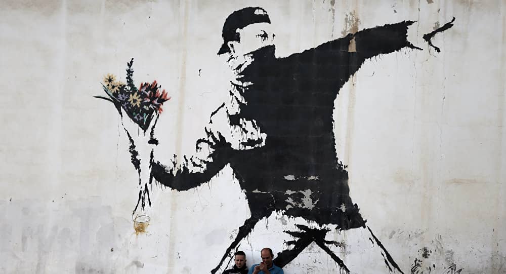 Arrojando flores, Banksy wall art