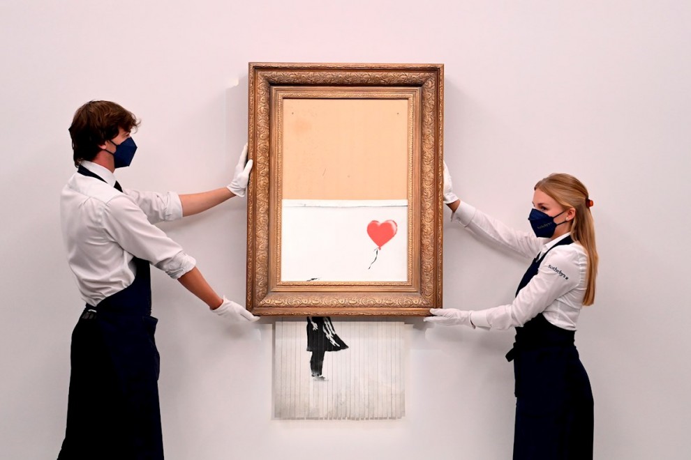 Girl with Balloon (Niña con globo) de Banksy, que se autodestruyó parcialmente durante una subasta en Londres