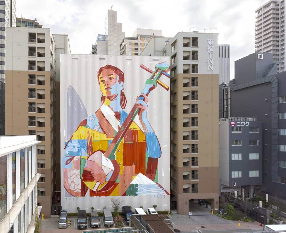 Mural de arte urbano en japon de aryz