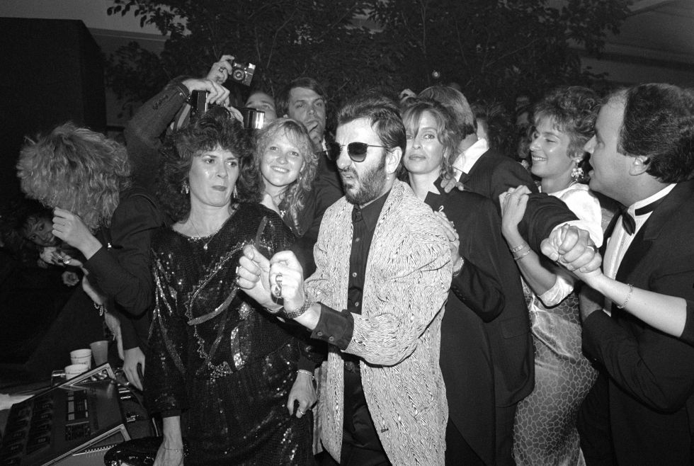 Richard Young fotografiando celebrities