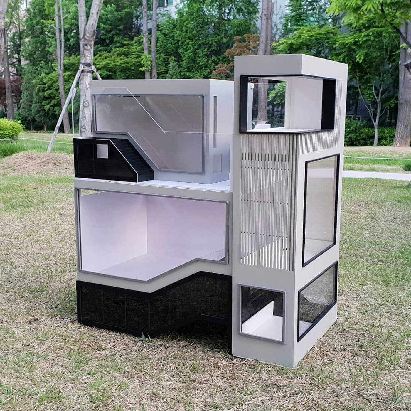 jaula minimalista para hamster de tres alturas