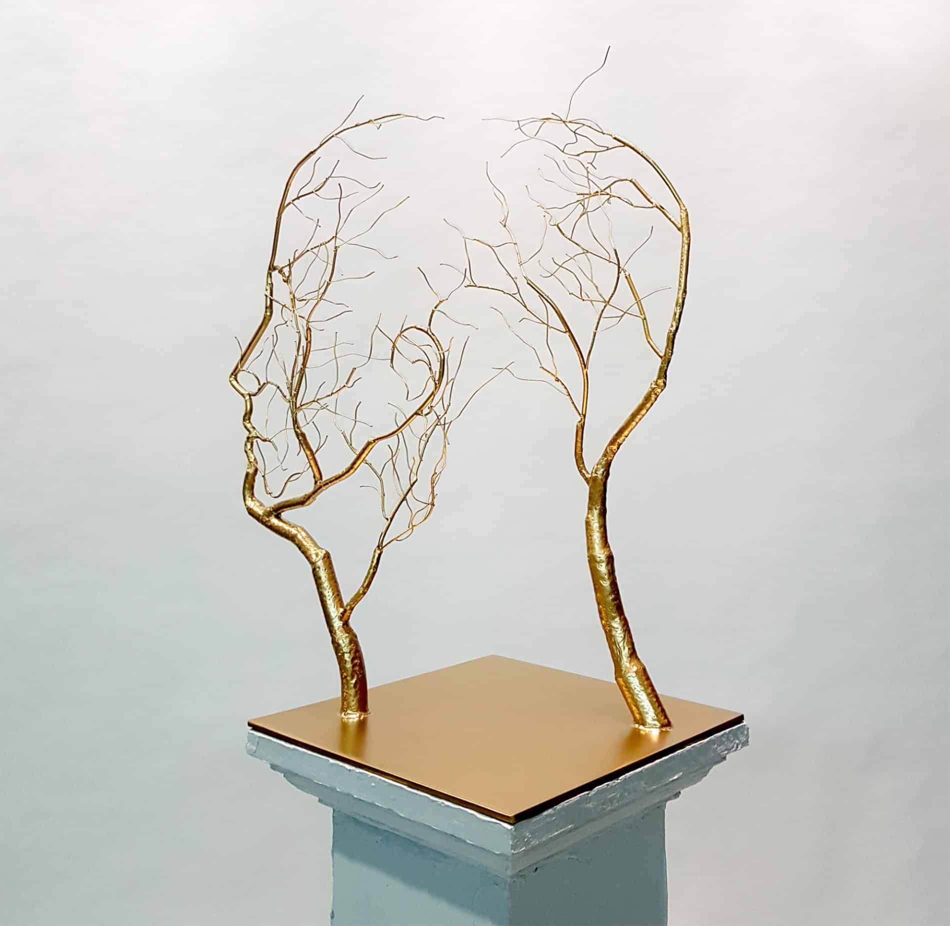 raices de acero inoxidable sun hyuk kim cabeza oro
