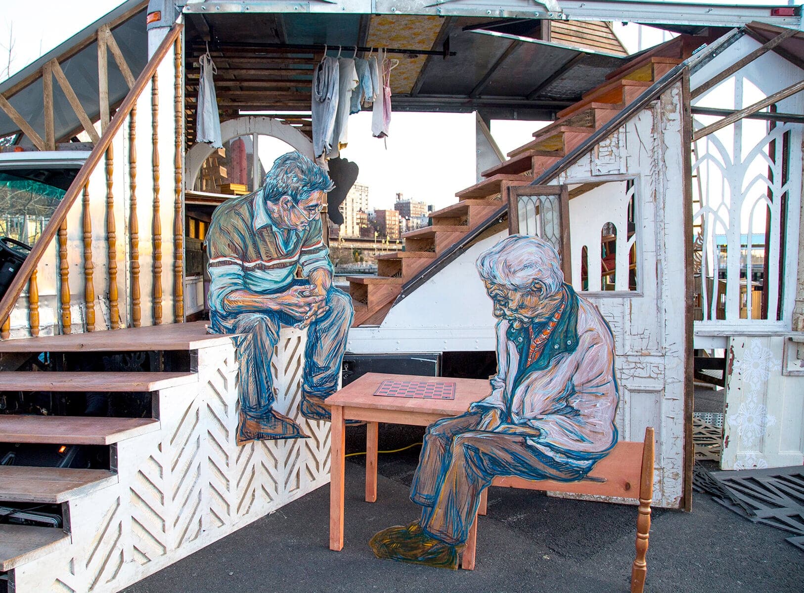obra itinerante swoon familia, esvultura movil tranbforma camion, padre e hijo