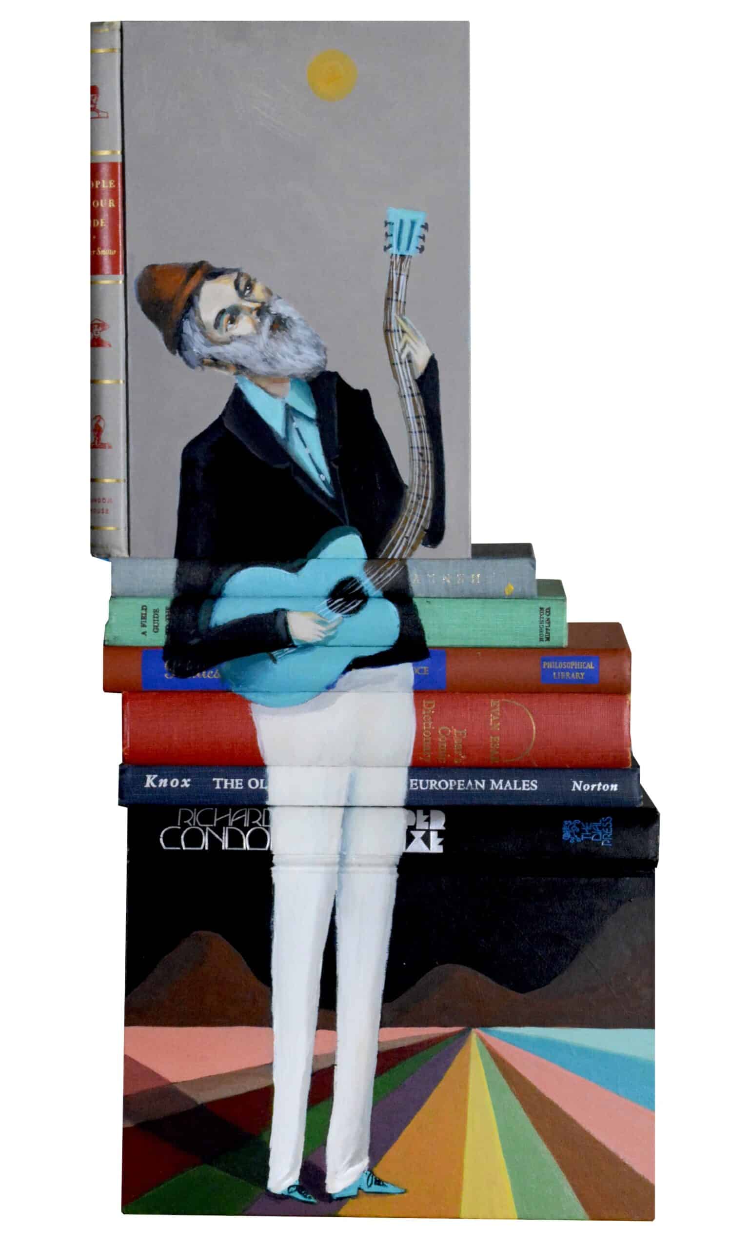 Mike Stilkey puntura y escultura con libros viejos hombre con guitarra