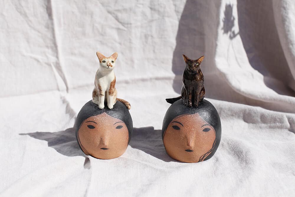 rami kim ceramista personajes en ceramica de uso funcional caras con mascotas