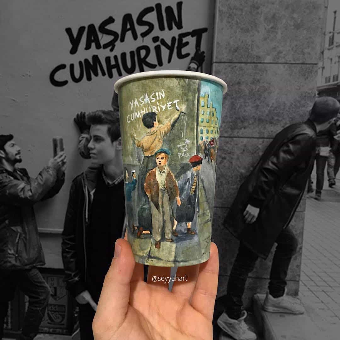 Berk Armagan artista viejero vasos de carton street art